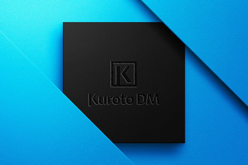 Kuroto DM identity on black and electric blue branded materials